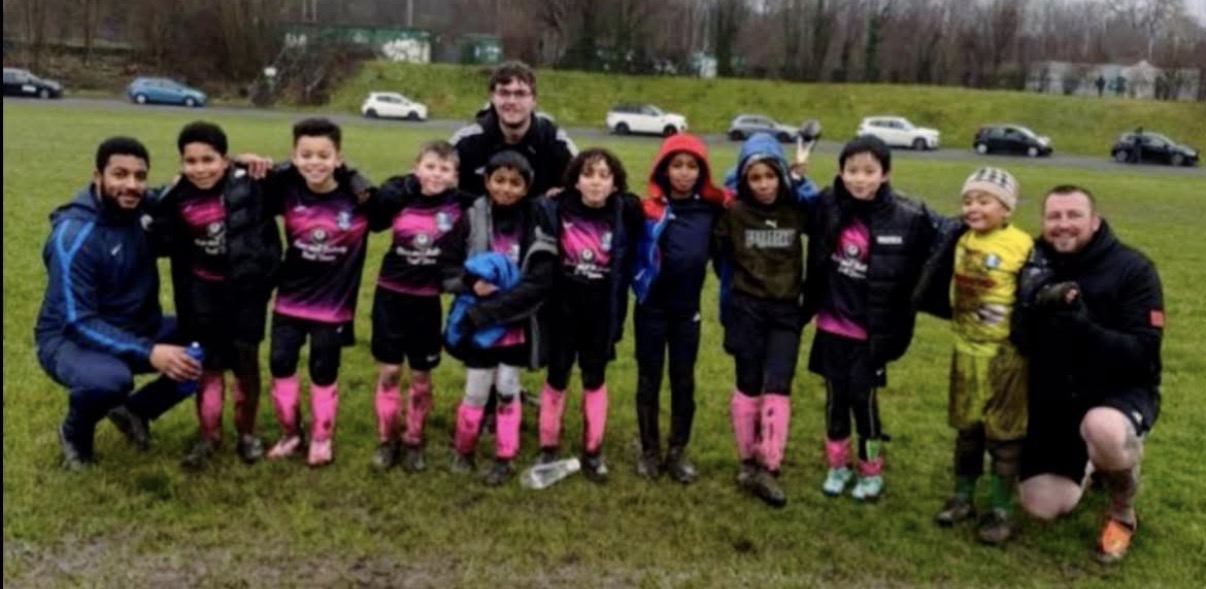 MTH-FC junior players and coaches after a match